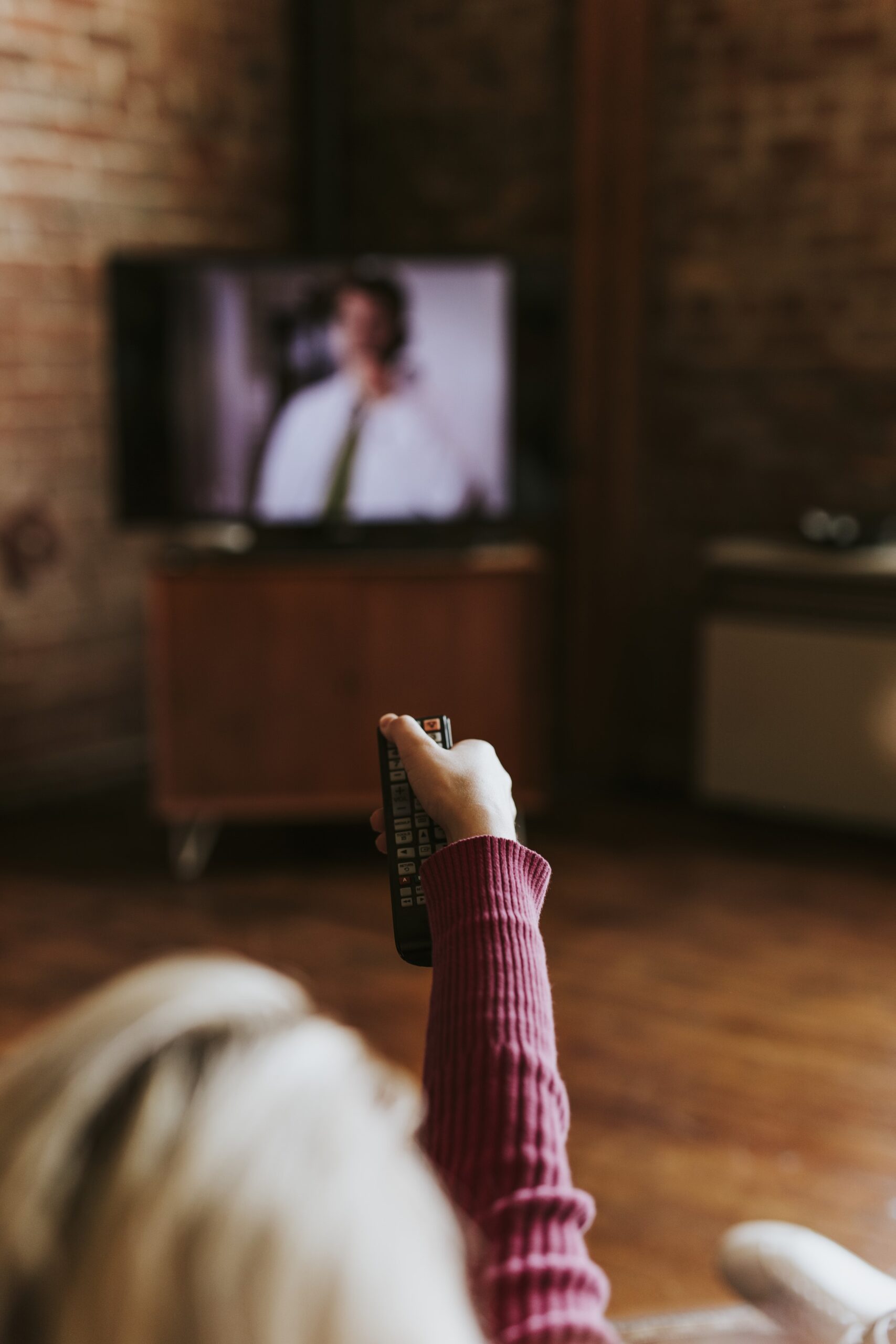 woman-swapping-tv-channels